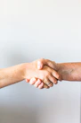 person holding hands of another person