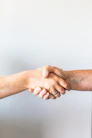 person holding hands of another person
