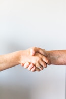 person holding hands of another person