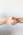 person holding hands of another person