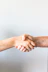 person holding hands of another person