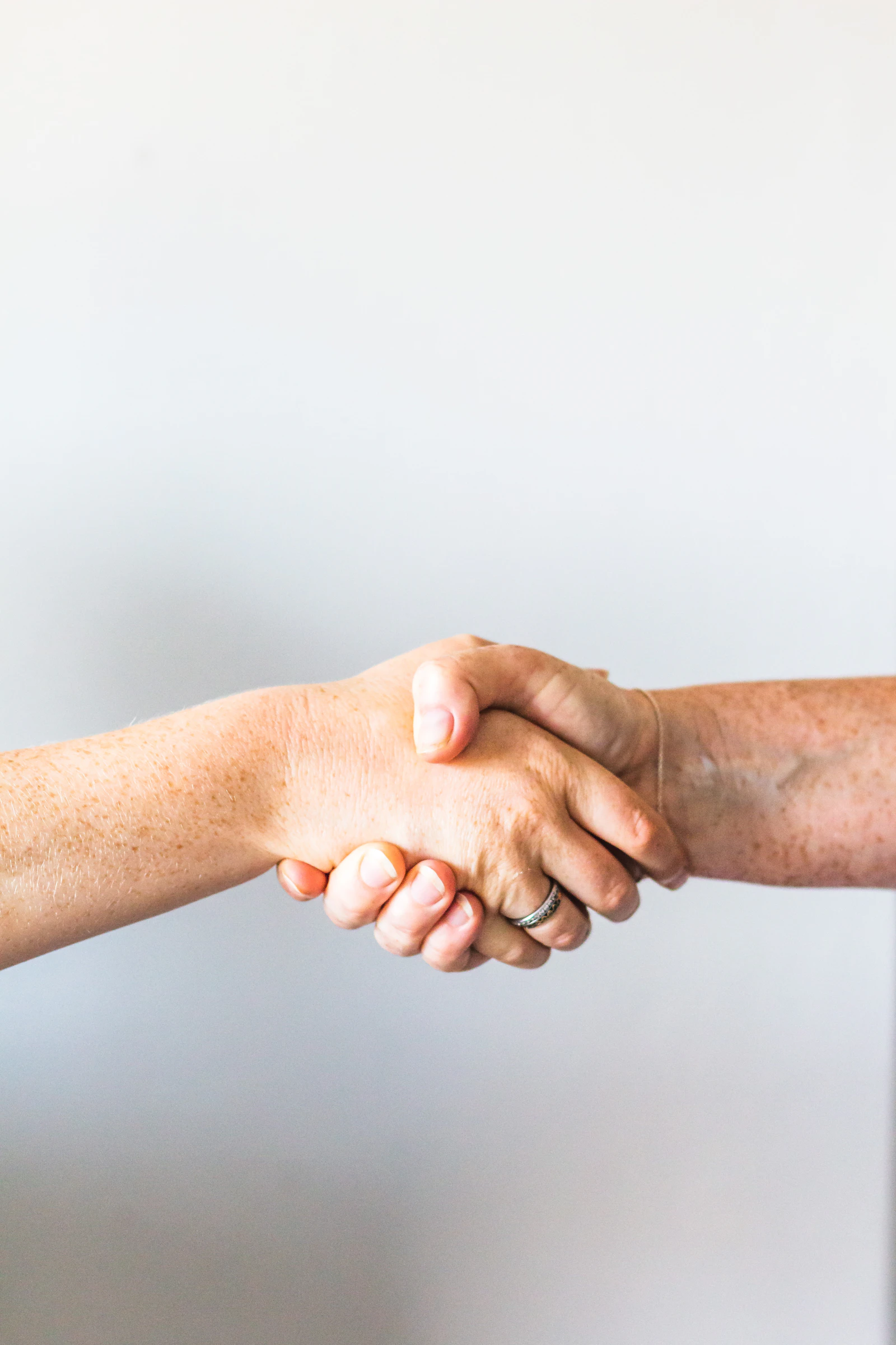 Two people holding hands to represent mutual support, reassurance and partnership while living with diabetes.