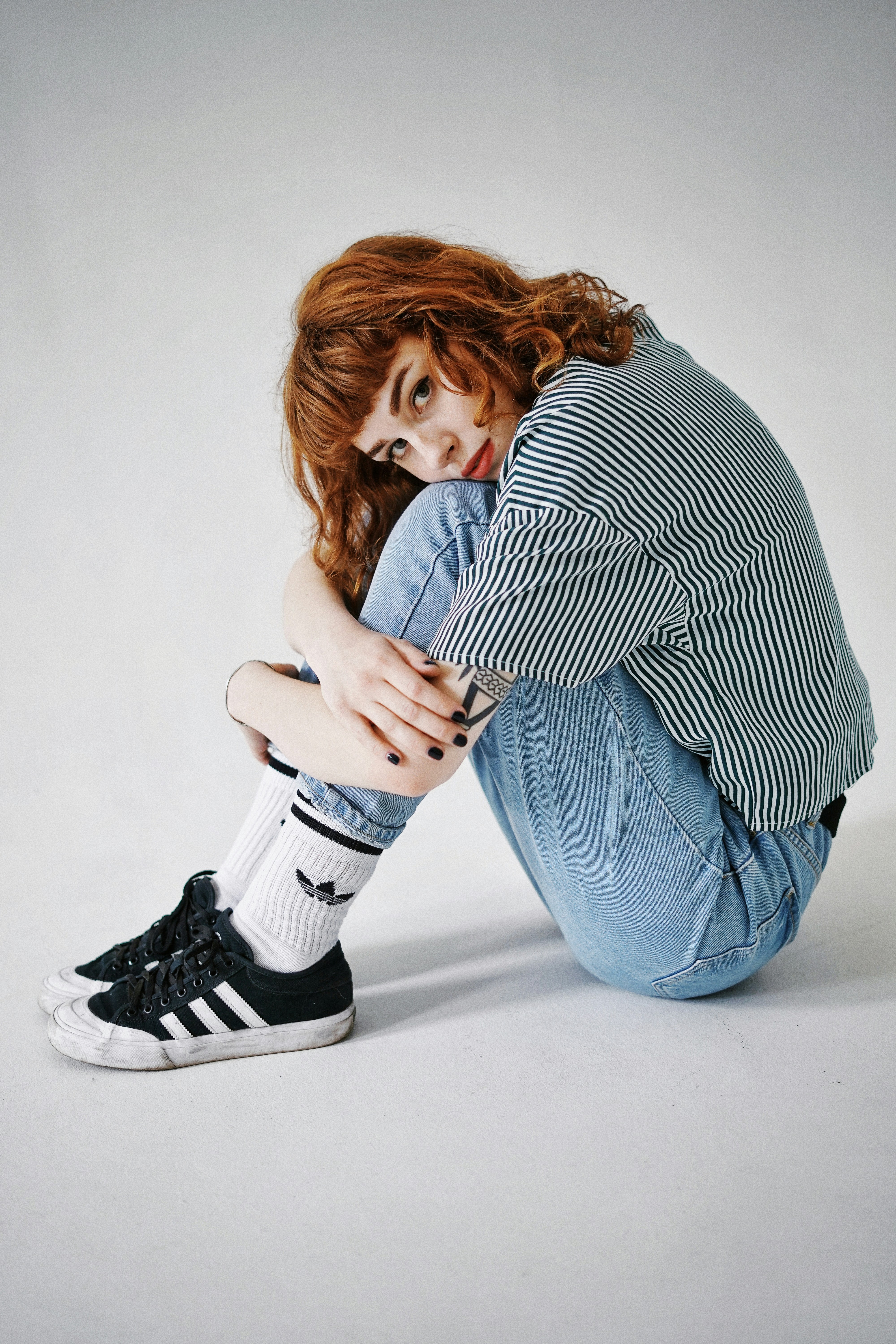 Woman In Black And White Striped Long Sleeve Shirt And Blue Denim Jeans Photo Free Kyiv Image On Unsplash