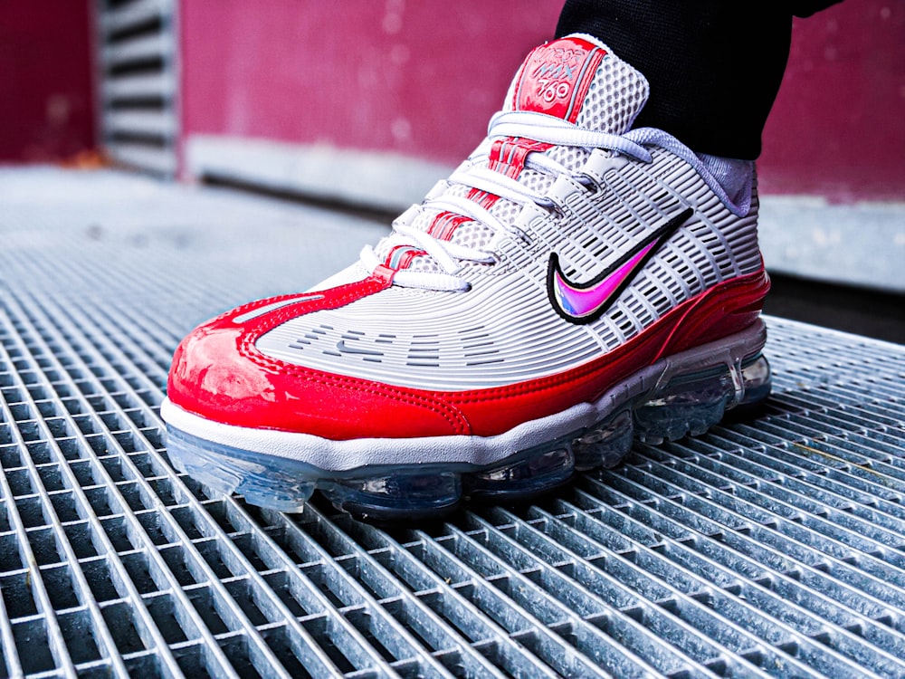 red and white nike running shoes photo – Free Image on Unsplash