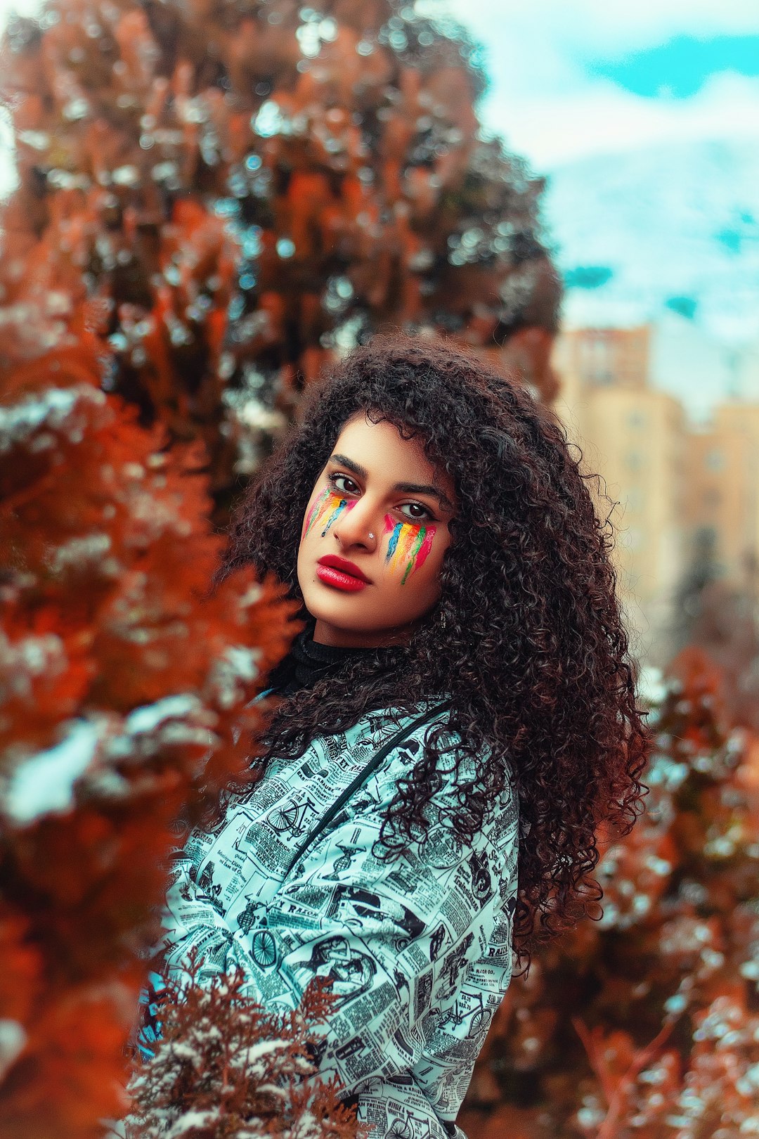 woman in white and black floral shirt