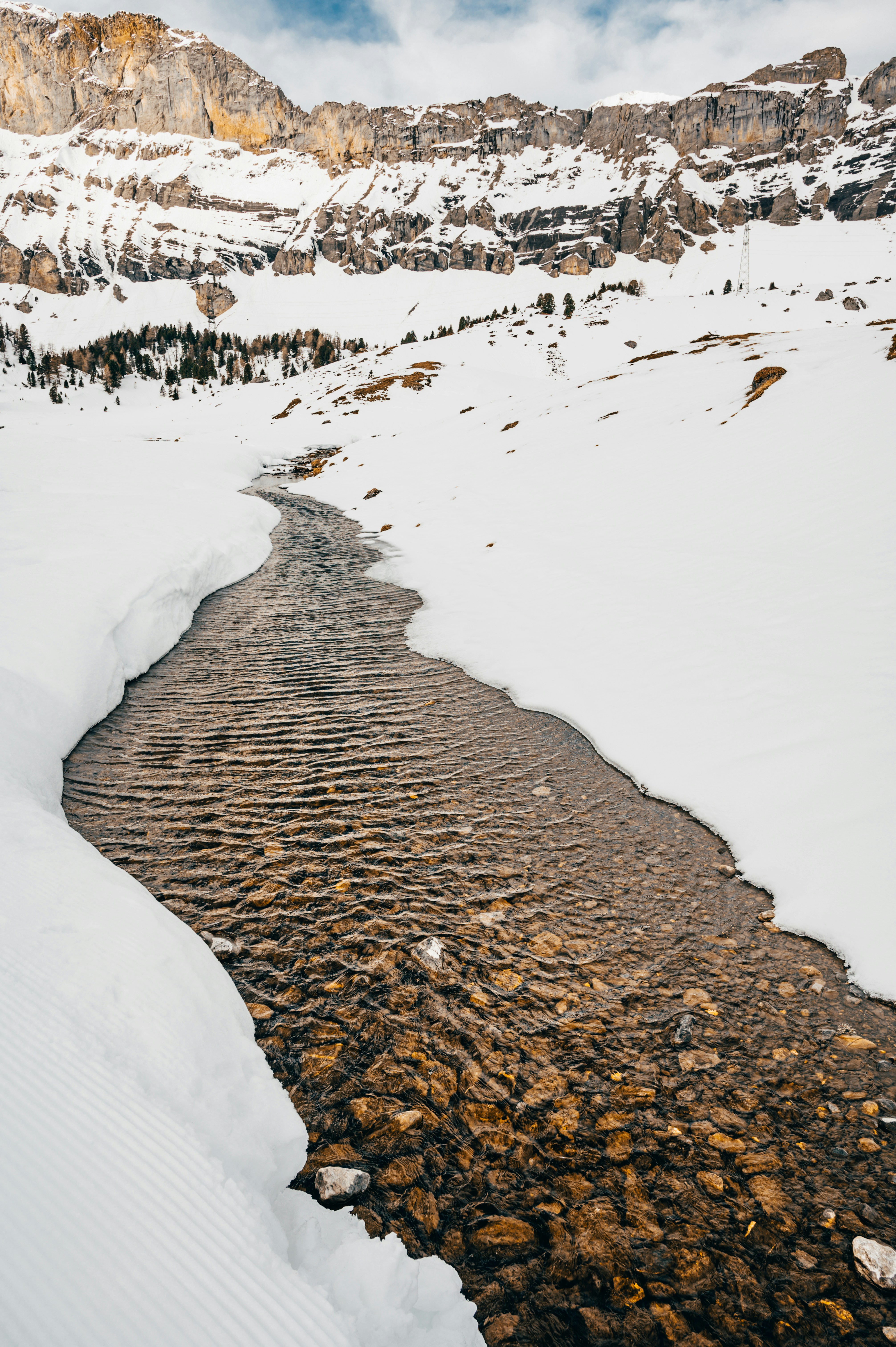 brown sand and white snow
