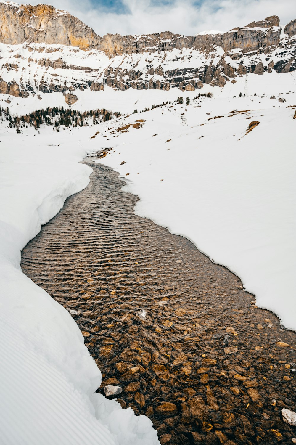 brown sand and white snow