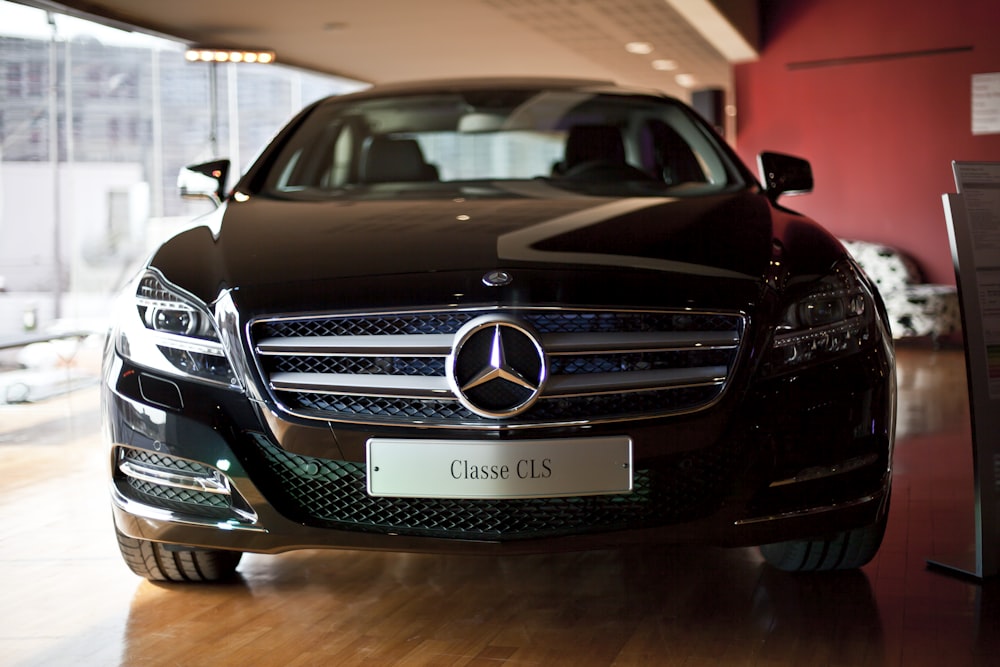 black mercedes benz car in a parking lot