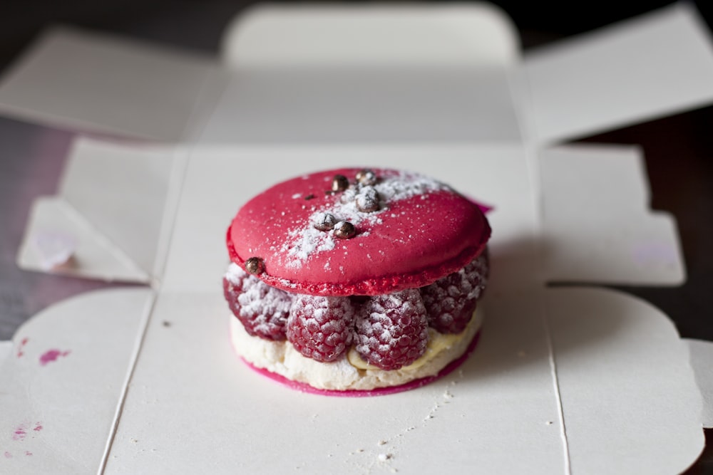 strawberry and chocolate burger on white table