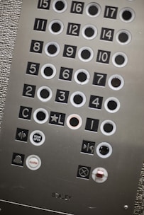 Elevator control panel showing advanced safety features and technology.