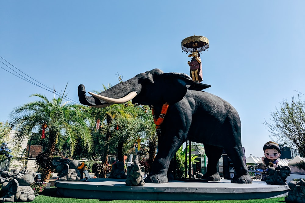 black elephant statue under blue sky during daytime