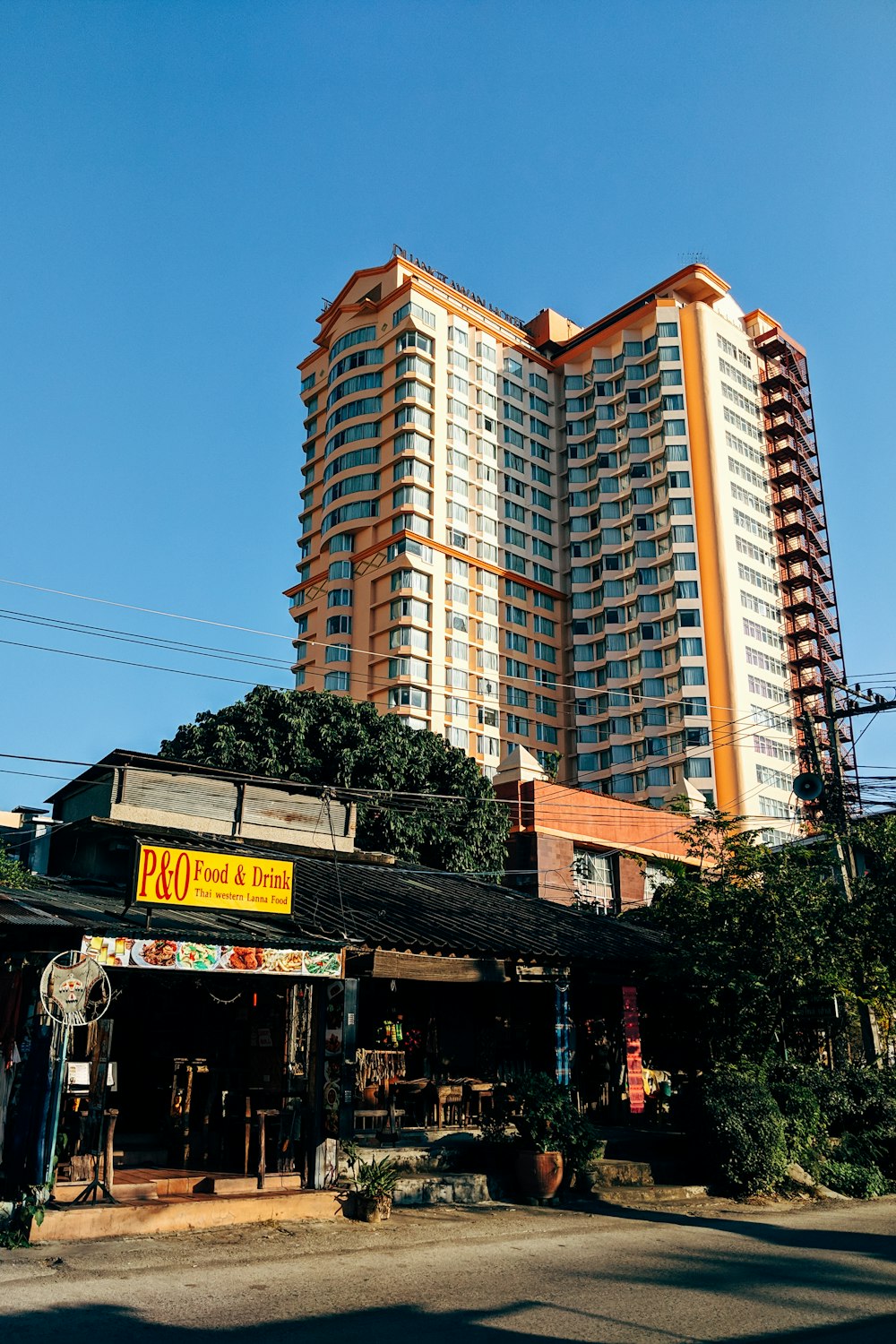 brown and white concrete building under blue sky during daytime