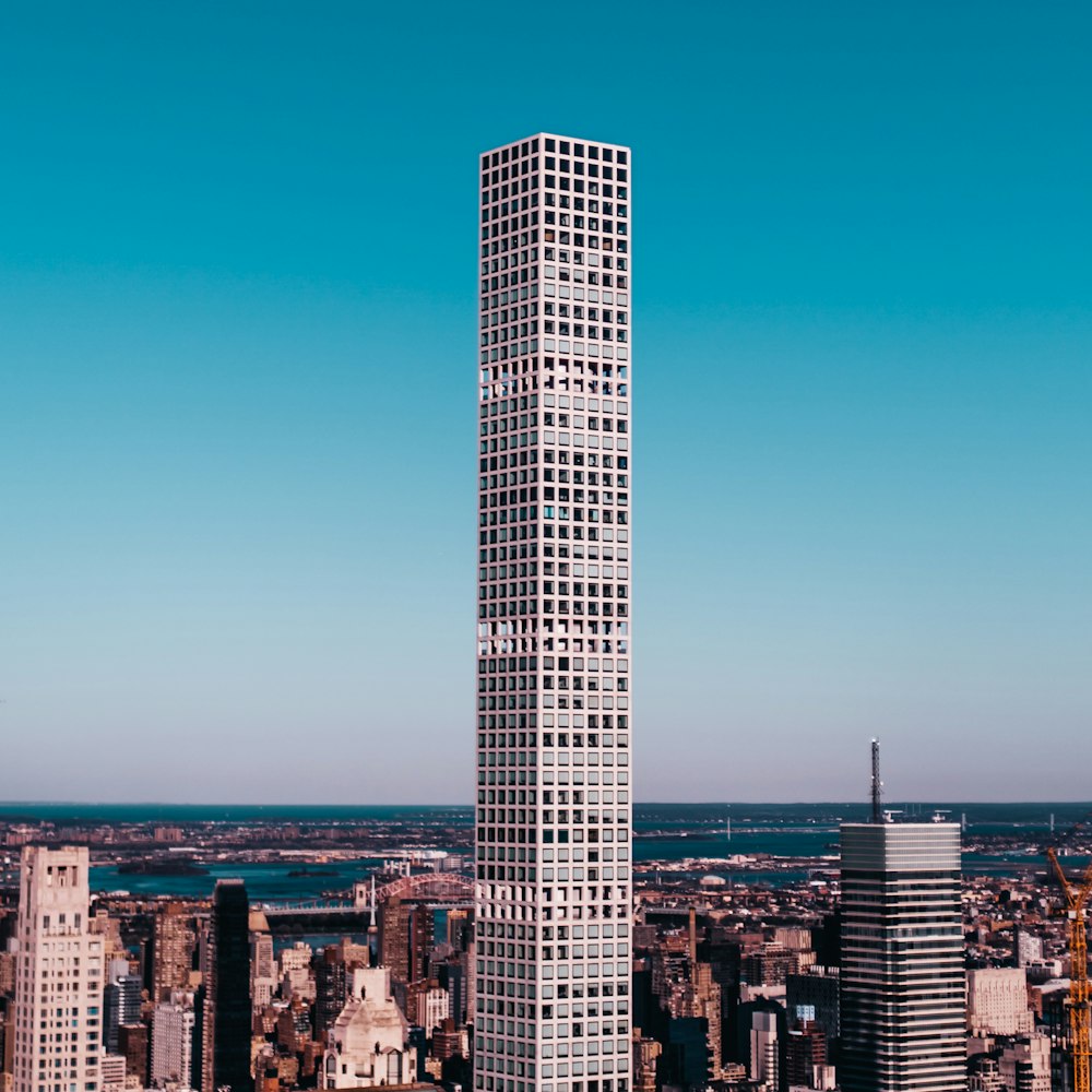 high rise building near body of water during daytime