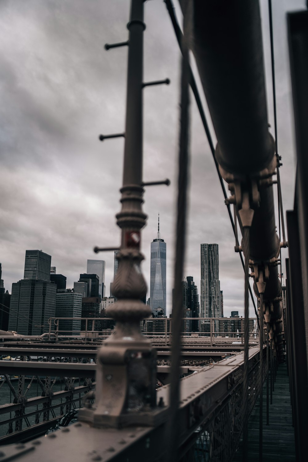 city skyline under cloudy sky during daytime