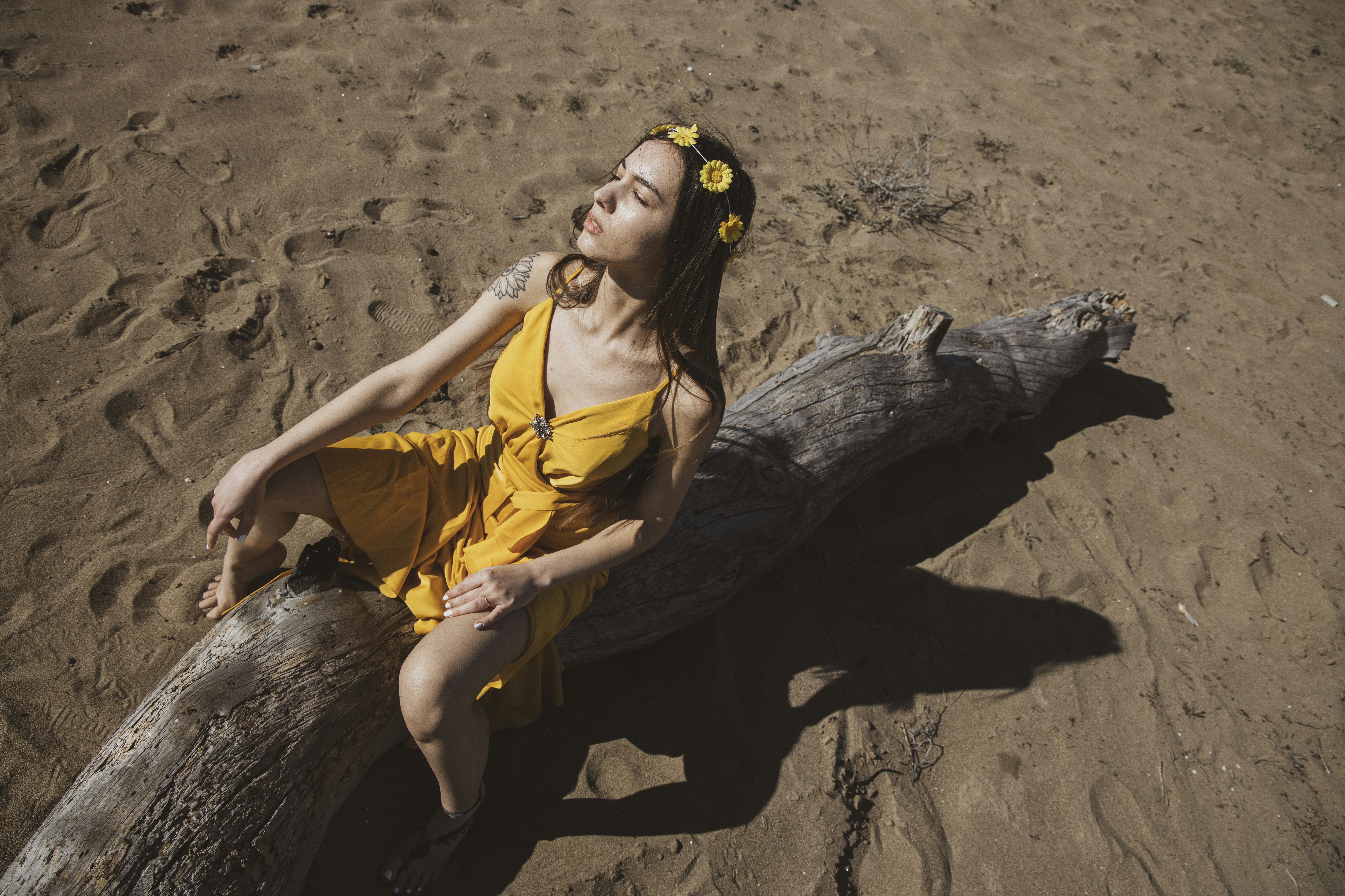 Attractive girl in the yellow dress