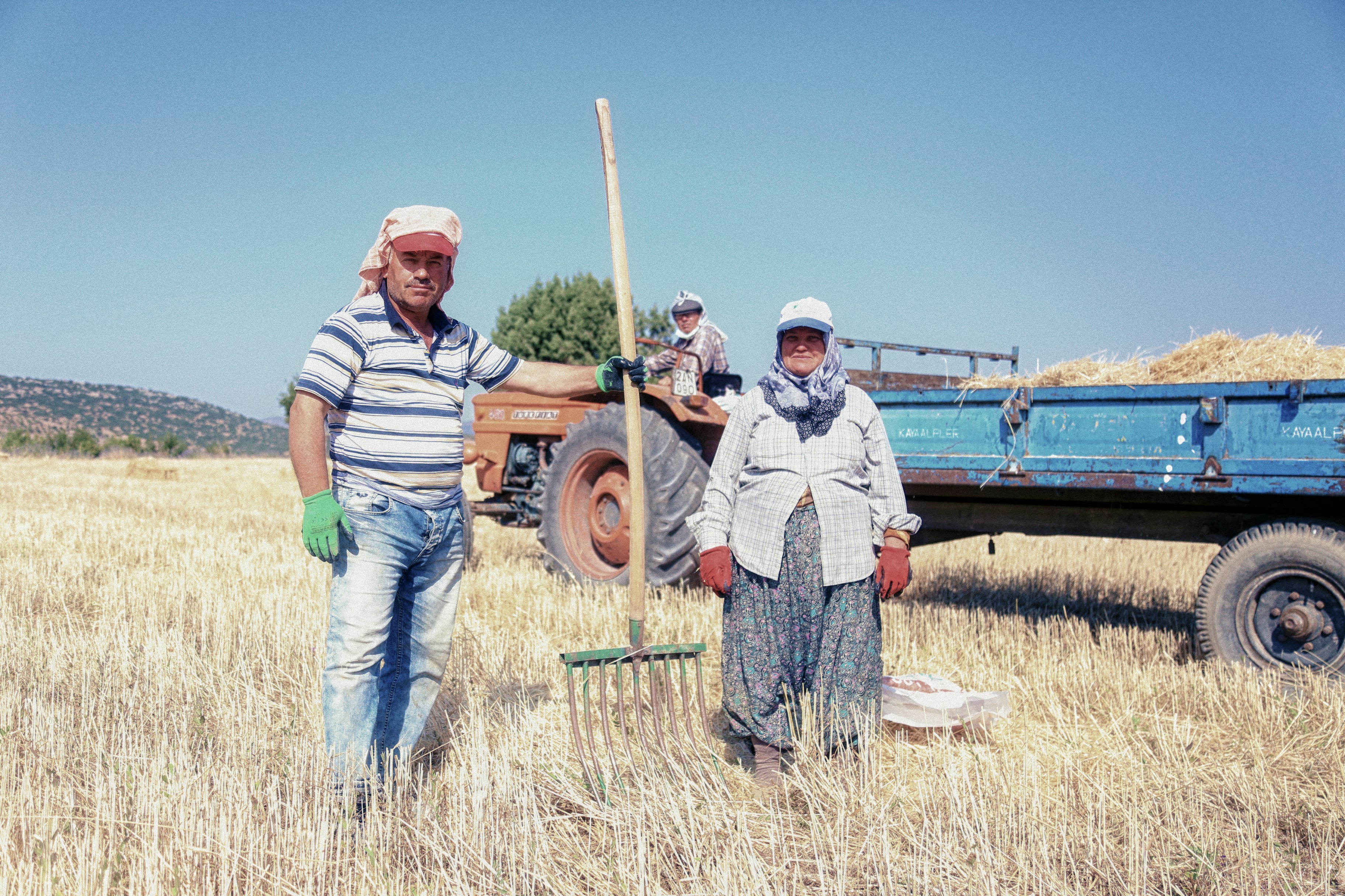 Expert trainers demonstrating farming techniques to farmers