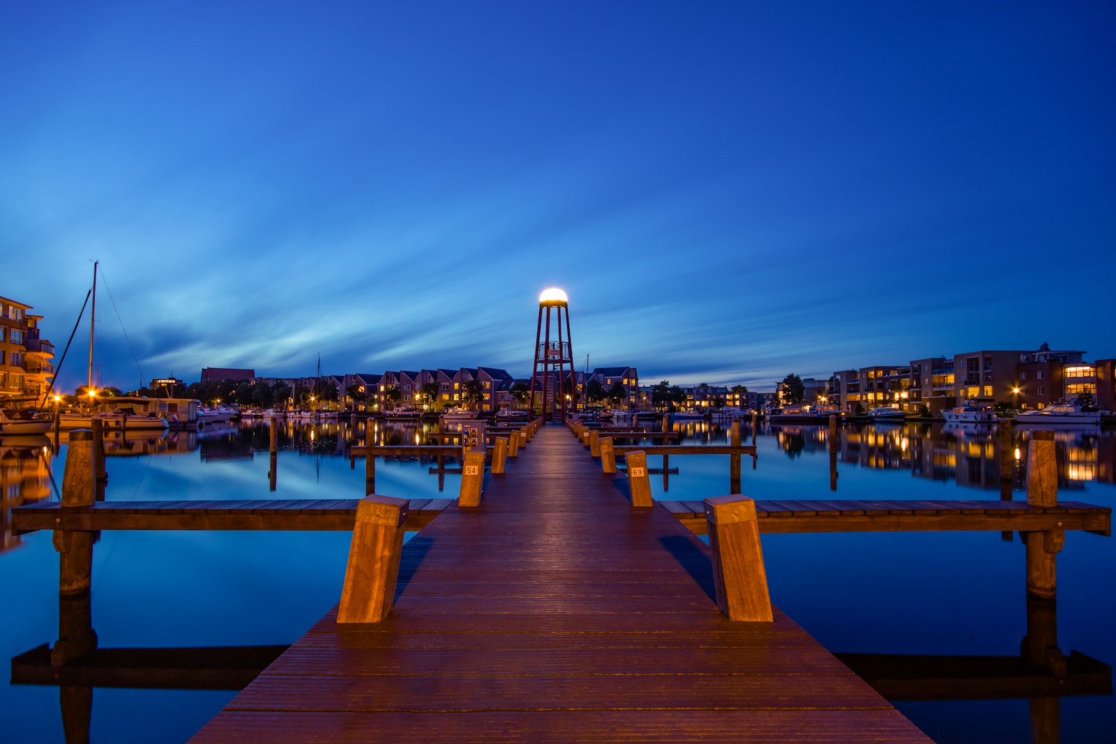 Sigma 10-20mm F4-5.6 EX DC HSM sample photo. Brown wooden dock on photography