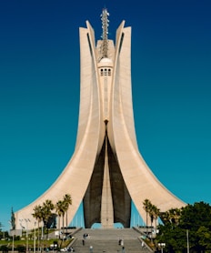 white concrete building under blue sky during daytime