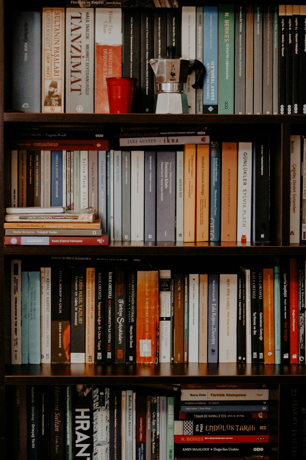 books on black wooden shelf