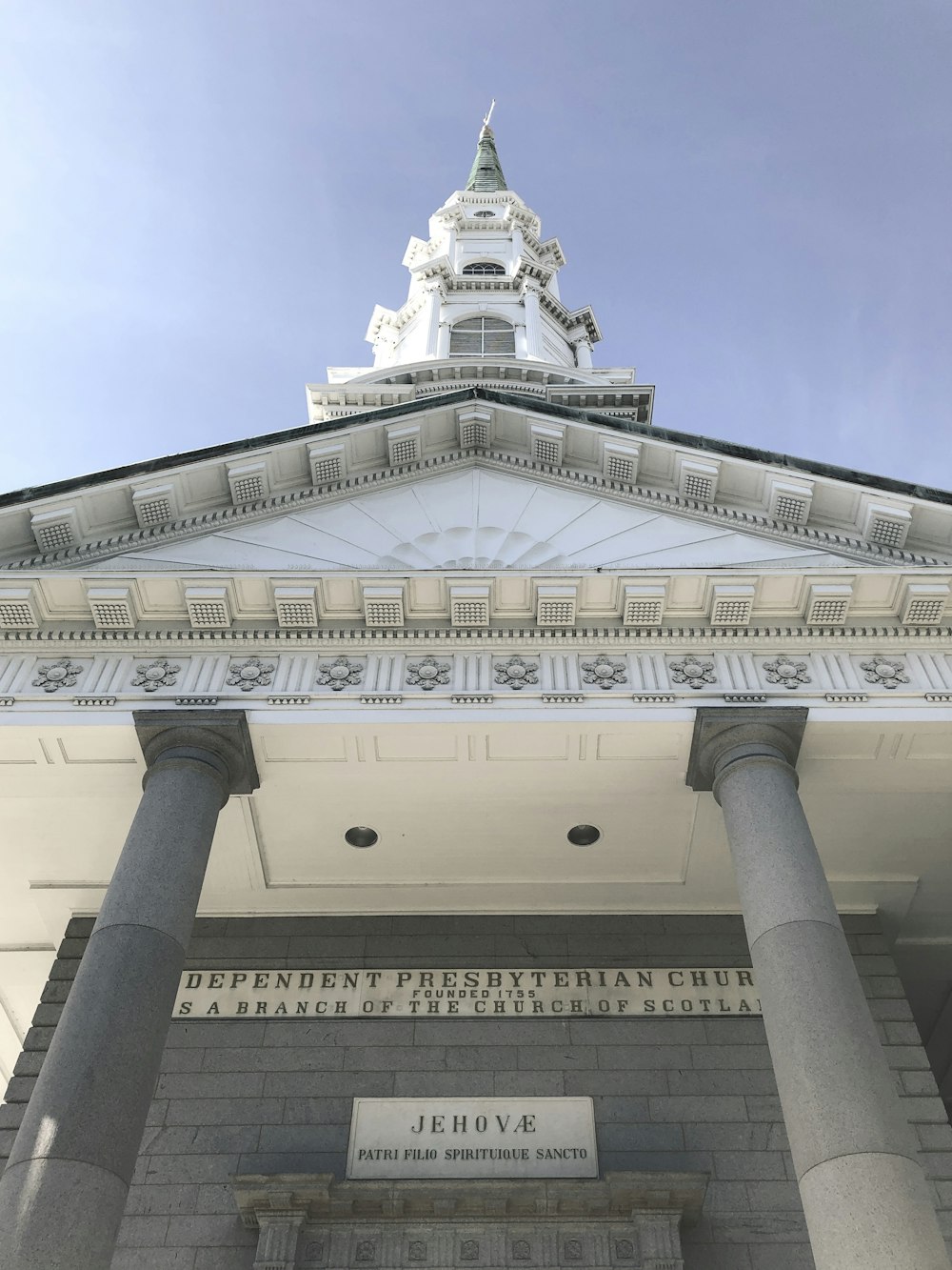 white concrete building under blue sky during daytime