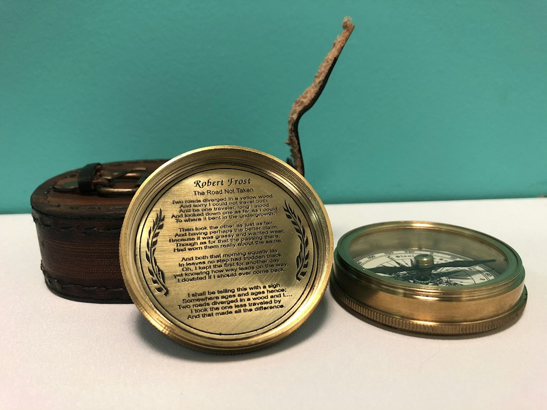 silver round container on blue surface, Marine Pocket Compass - 1920