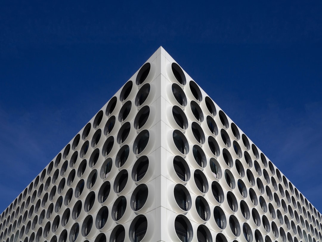 white concrete building under blue sky during daytime