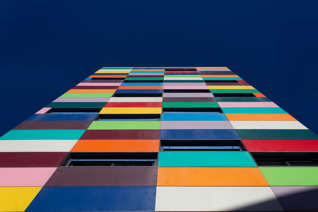 blue orange and yellow striped textile