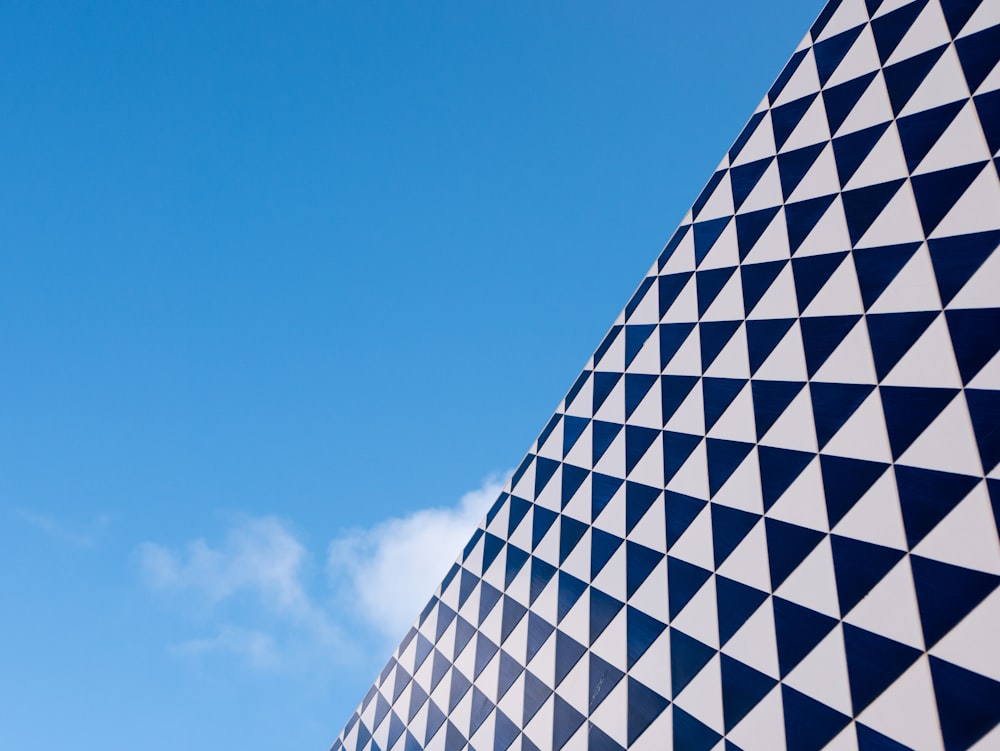 white and black concrete building under blue sky during daytime