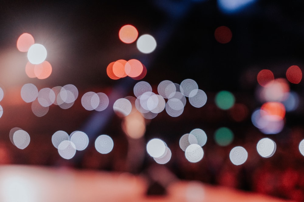 white and blue bokeh lights