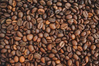 brown coffee beans on brown wooden table