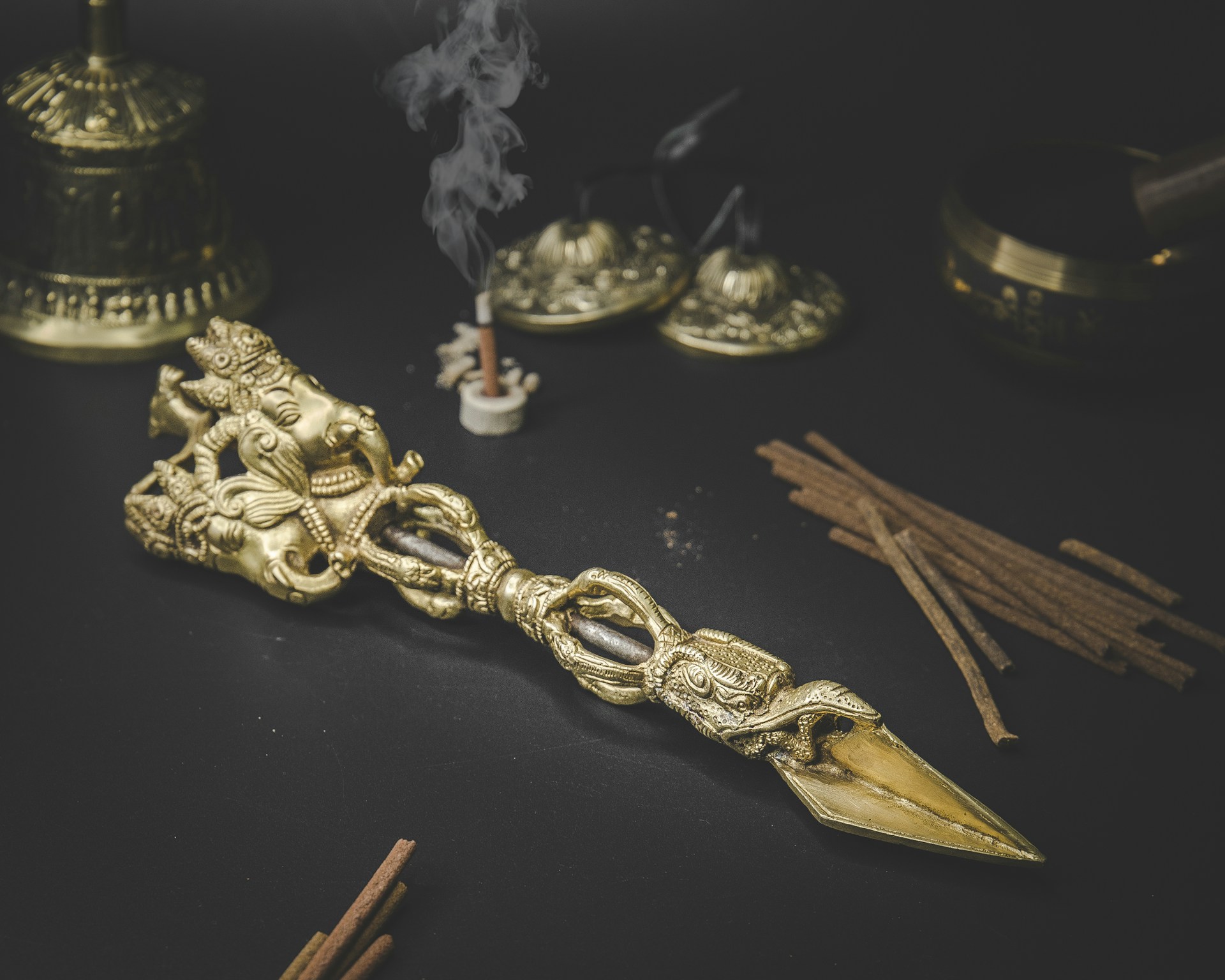gold and silver trophy on black table