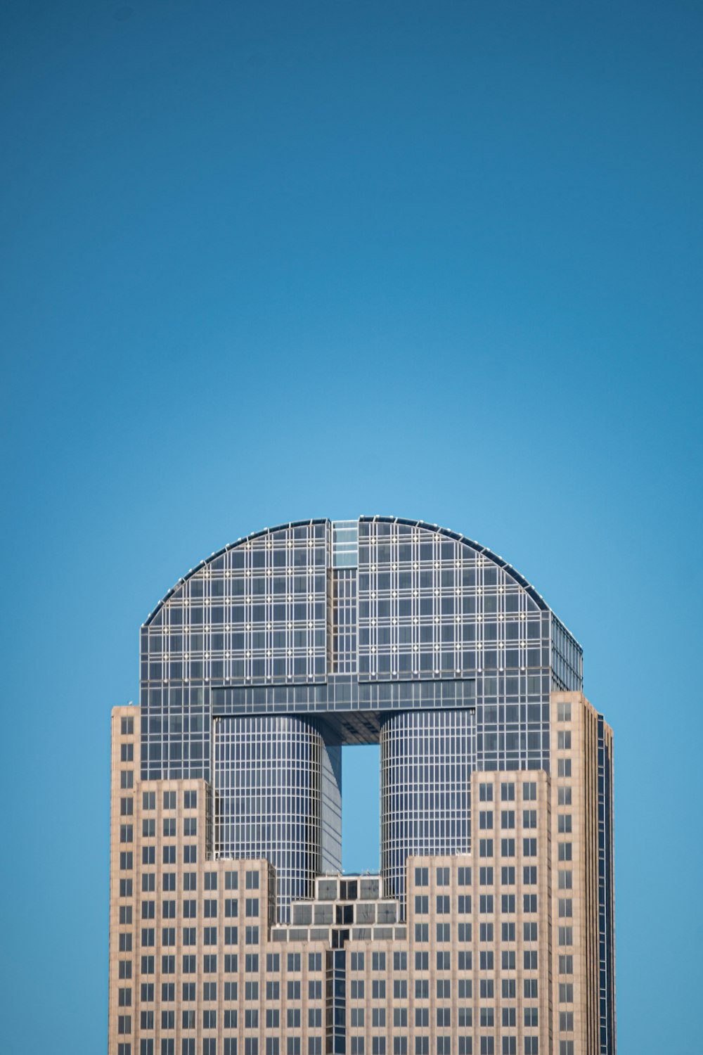 white and black concrete building under blue sky during daytime