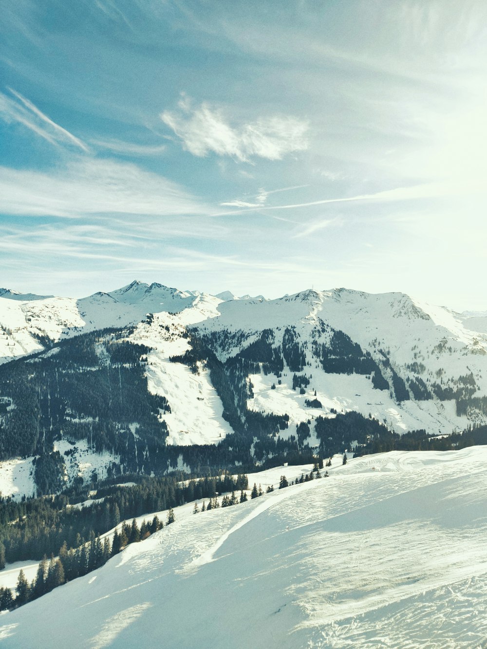 snow covered mountain under blue sky during daytime