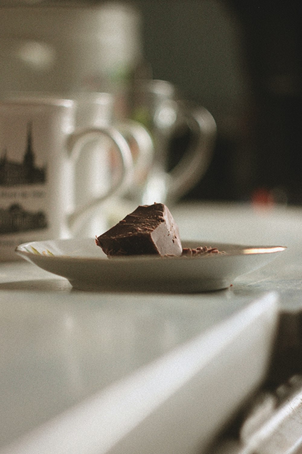 sliced chocolate cake on white ceramic plate