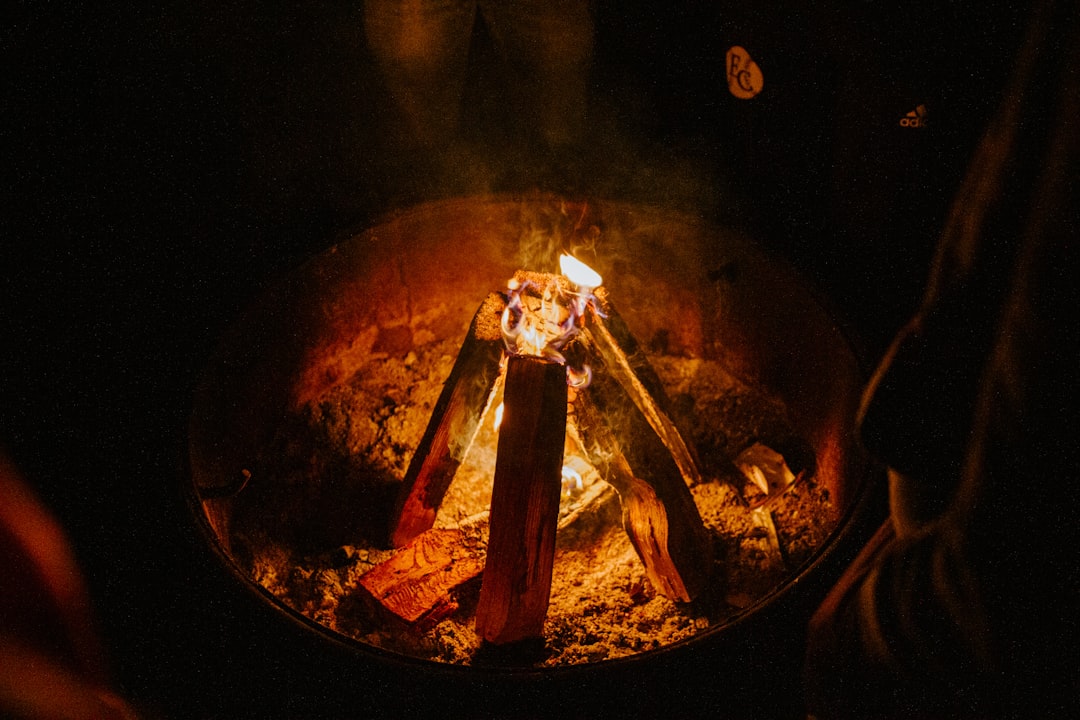 fire in brown round pot