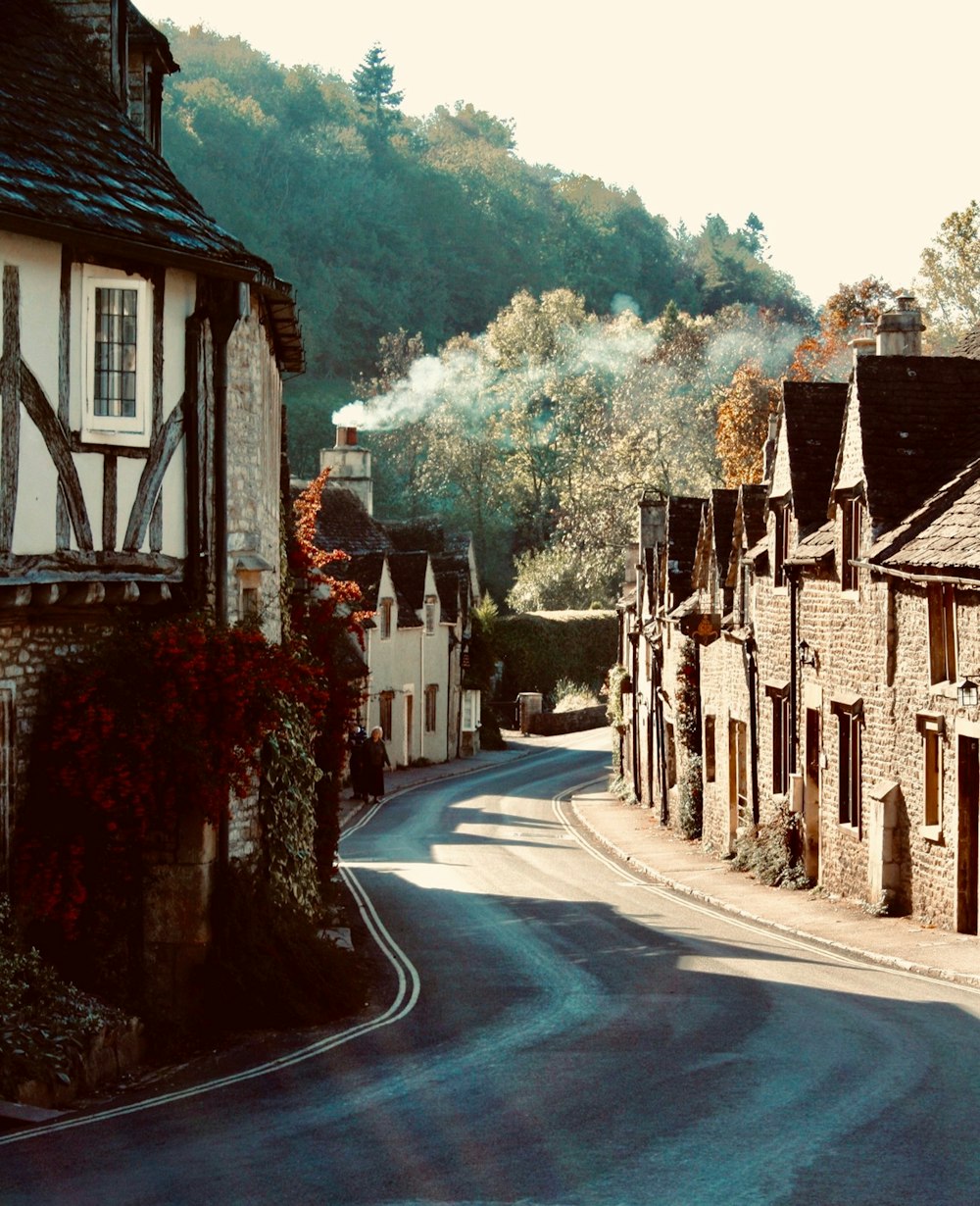 brown brick houses near road during daytime