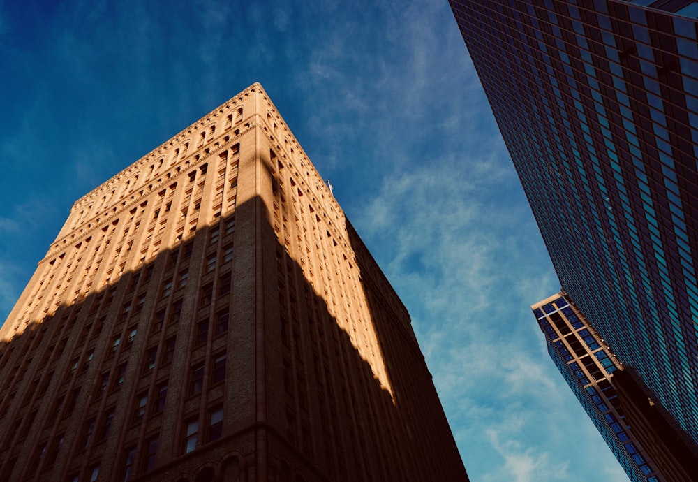 brown concrete building under blue sky during daytime