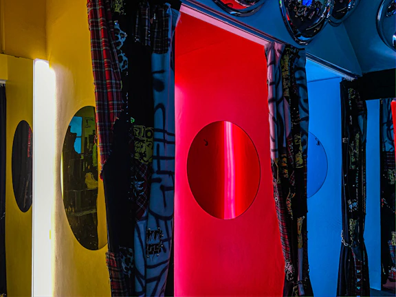 Modern event space featuring an Instagram mirror with vibrant gradient lighting accents.