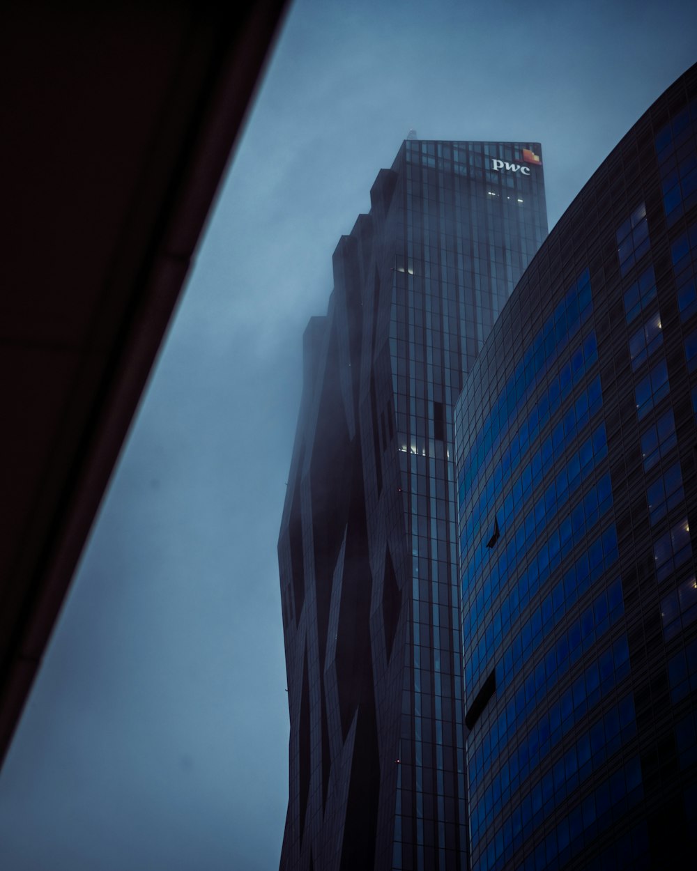 low angle photography of high rise building