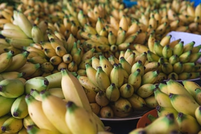 yellow banana fruit on blue textile brunei zoom background