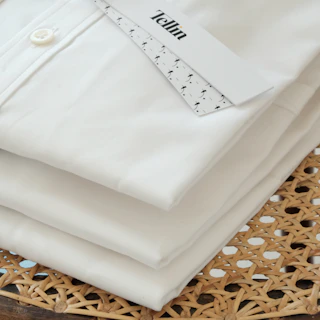 Detail serat bahan katun seragam untuk kemeja putih kantoran