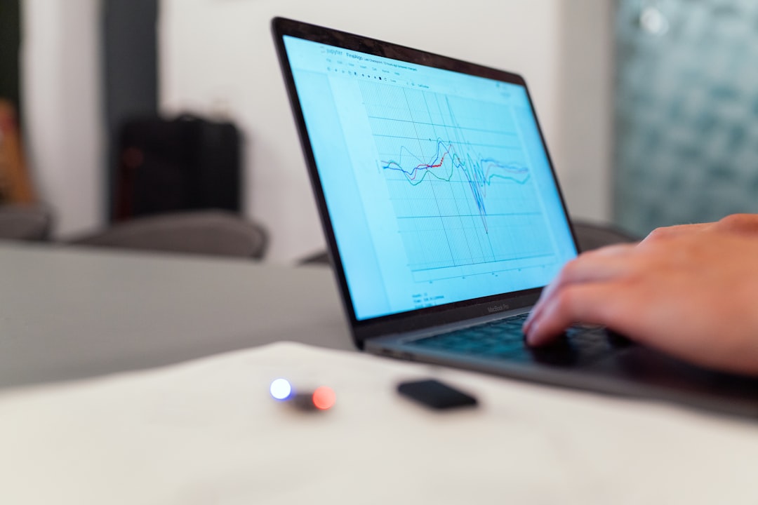 Laptop displaying graphs of boxing data