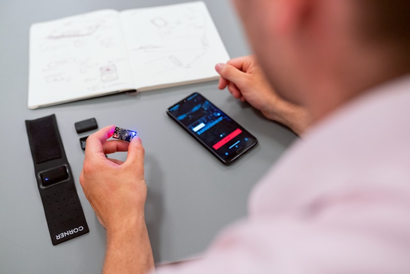 Running bundle numbers on a phone beside a notebook of policy quotes