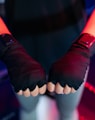 person wearing black socks and red rubber band
