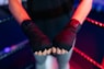 person wearing black socks and red rubber band