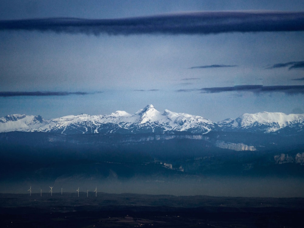 snow covered mountain during daytime