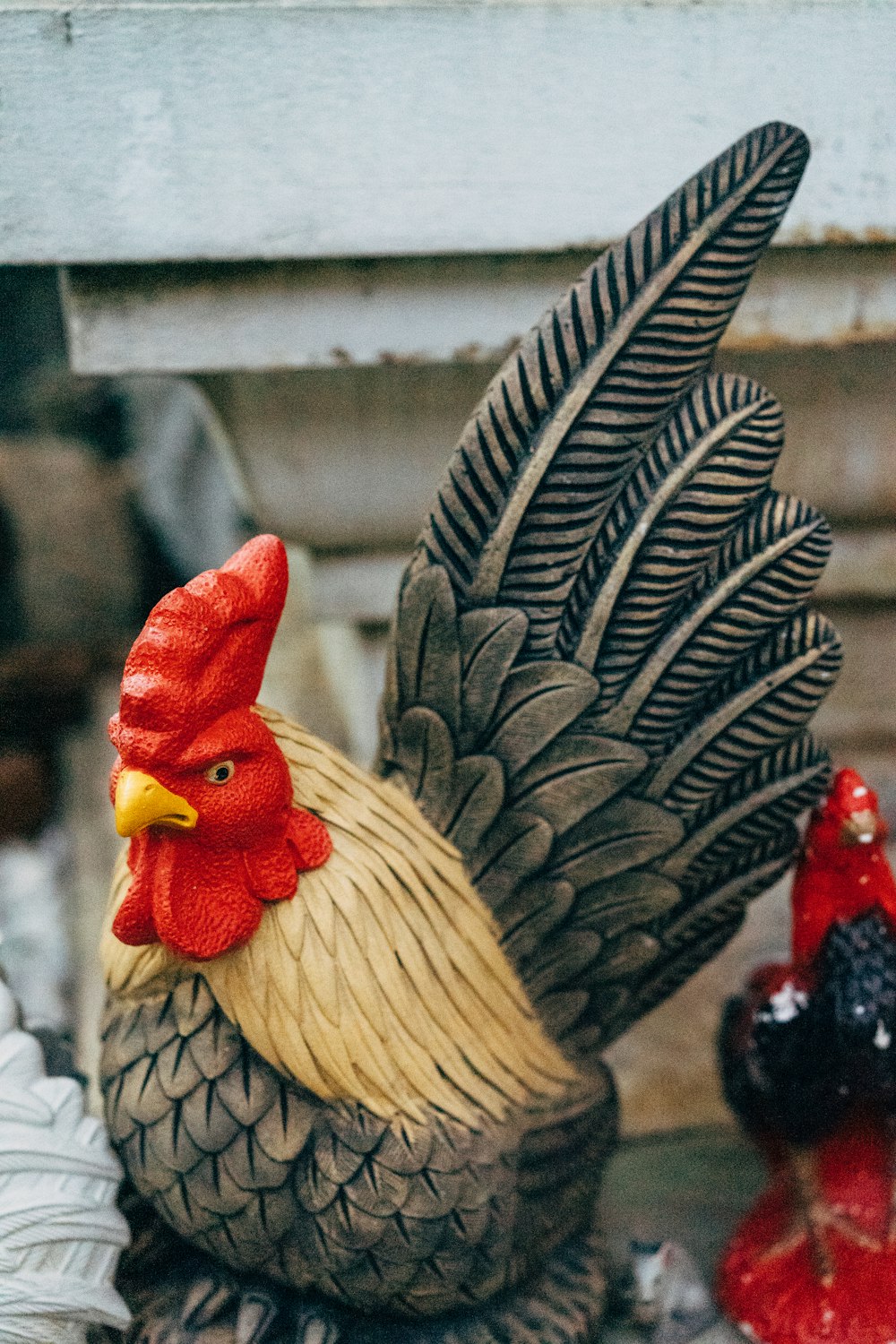 white and black rooster figurine