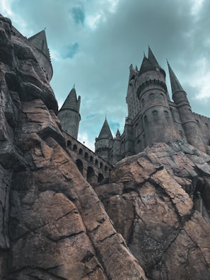 Epic castle fortress under dark swirling storm clouds in Stormwash.