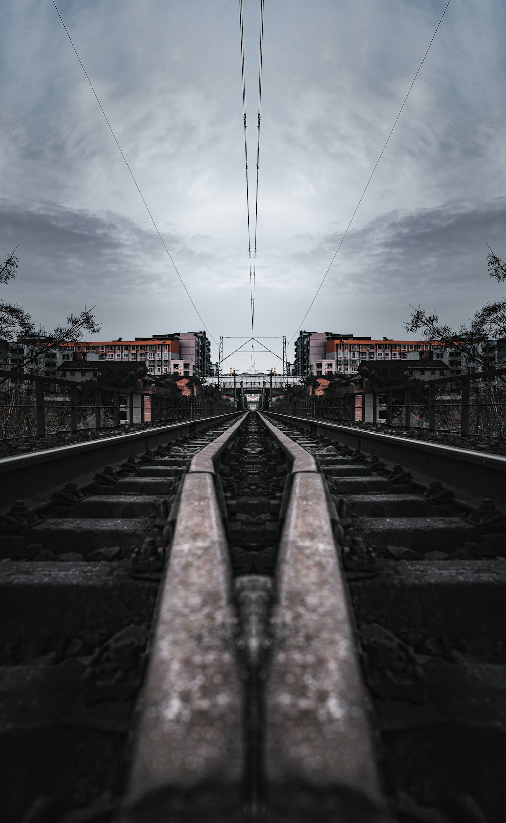 train rail under cloudy sky