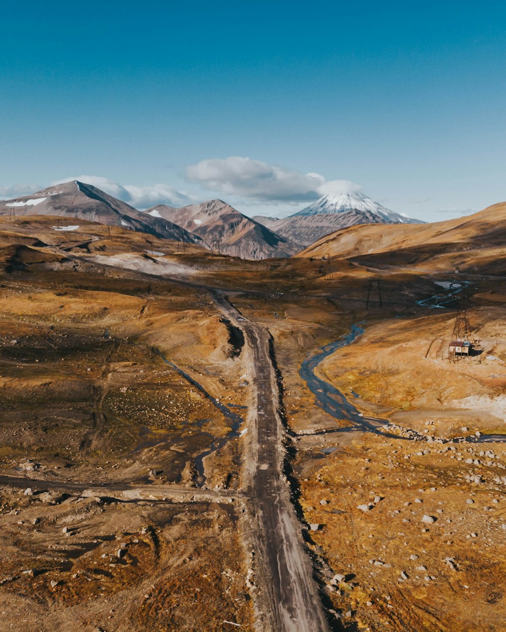 brown and gray mountains under blue sky during daytime